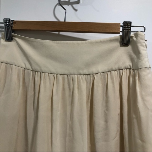 Club Monaco cream mini skirt with gray white beaded trim on bottom. Size 00. - Picture 4 of 6